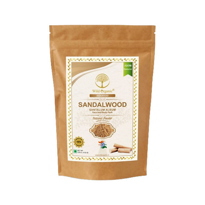Wild Organic sandalwood powder face and body pack in a jar, used for skin brightening and natural skincare.