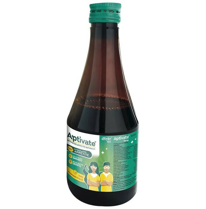 A bottle of Aptivate 100% Ayurvedic Pineapple Syrup for appetite, with a label showing pineapple imagery and herbal ingredients.