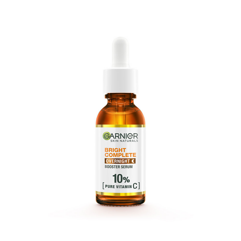 Garnier Bright Complete Vitamin C Night Serum in a sleek bottle, part of Garnier's night creams collection, with vibrant branding.