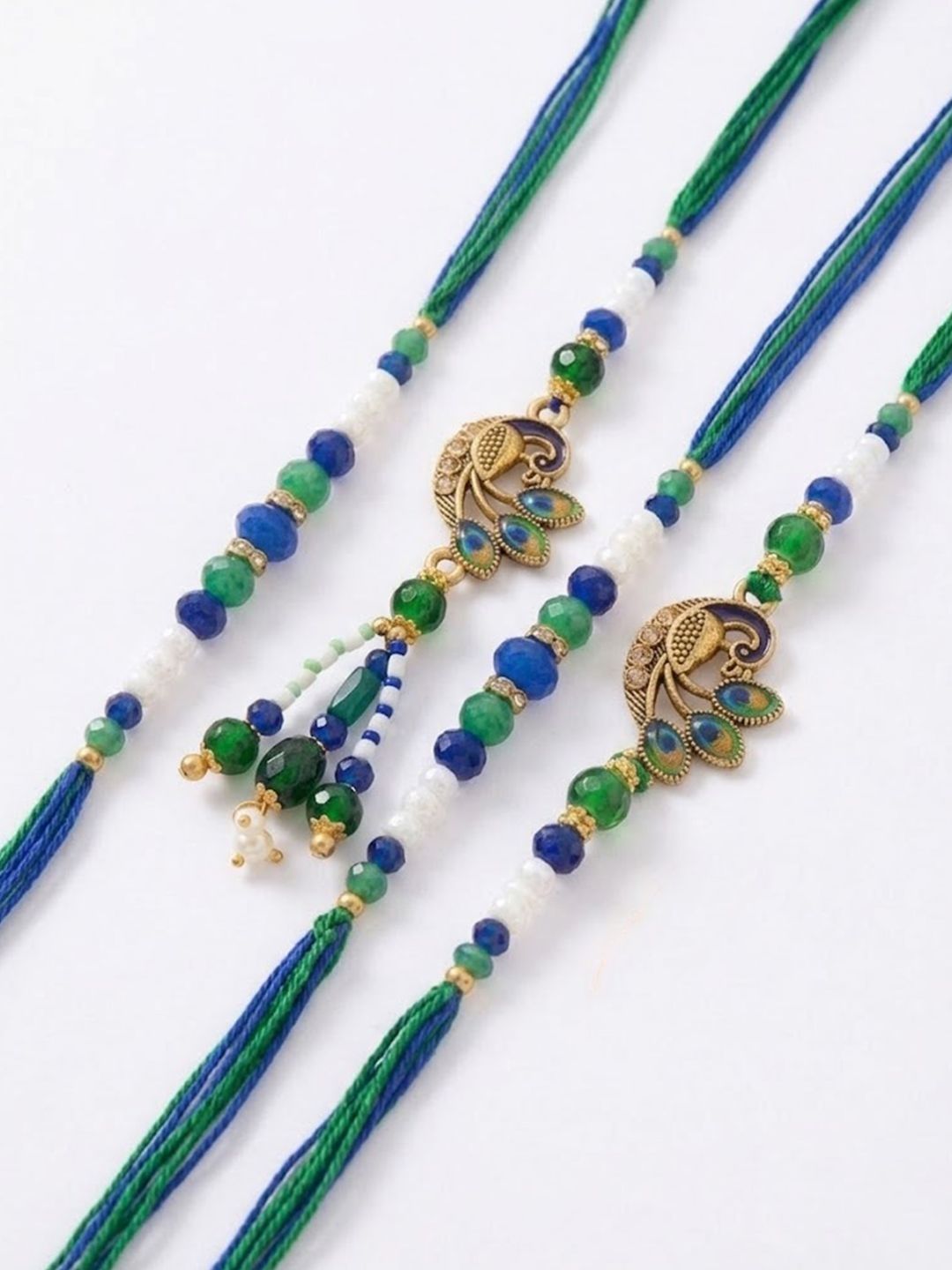Anouk Set Of 4 Green Peacock Design Artificial Beads Thread Rakhi With Roli Chawal
