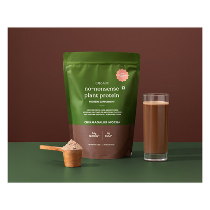 Cosmix No Nonsense Plant Protein Chikmagalur Mocha health drink in a glass, showing creamy mocha flavor with a rich, inviting appearance.