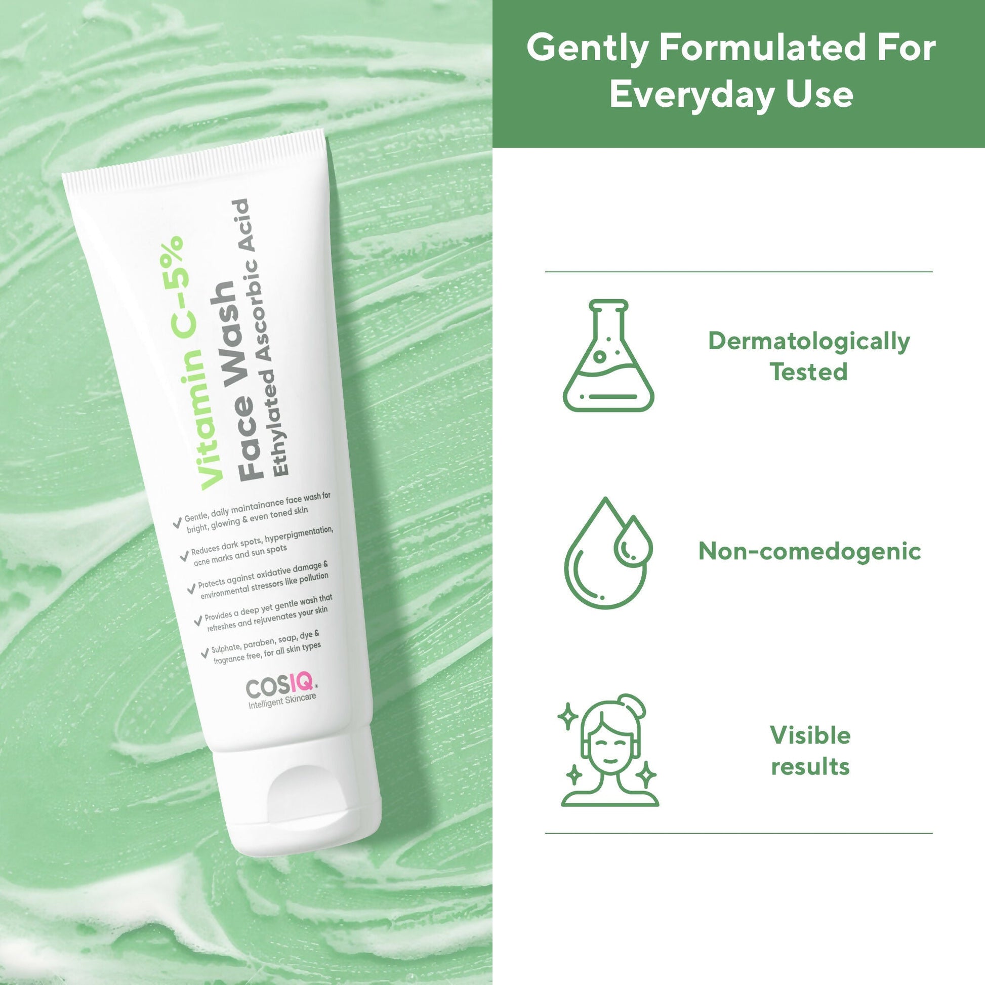 Cos-IQ Vitamin C-5% Brightening and Glow Face Wash with a clear bottle and foaming lather on a white background.