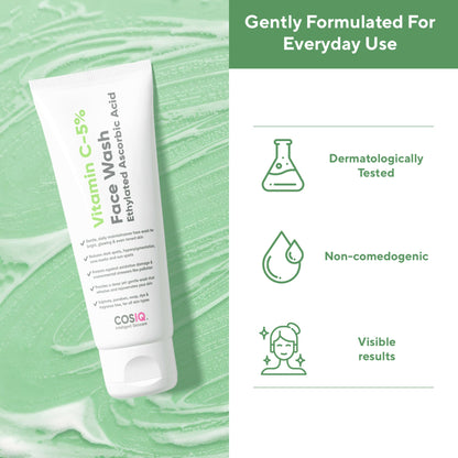 Cos-IQ Vitamin C-5% Brightening and Glow Face Wash with a clear bottle and foaming lather on a white background.