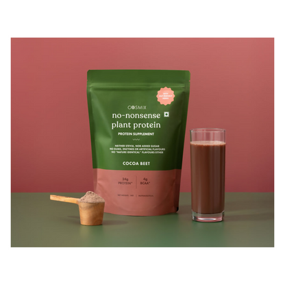 Cosmix No Nonsense Plant Protein Cocoa Beet health drink in a glass with cocoa and beet ingredients visible.