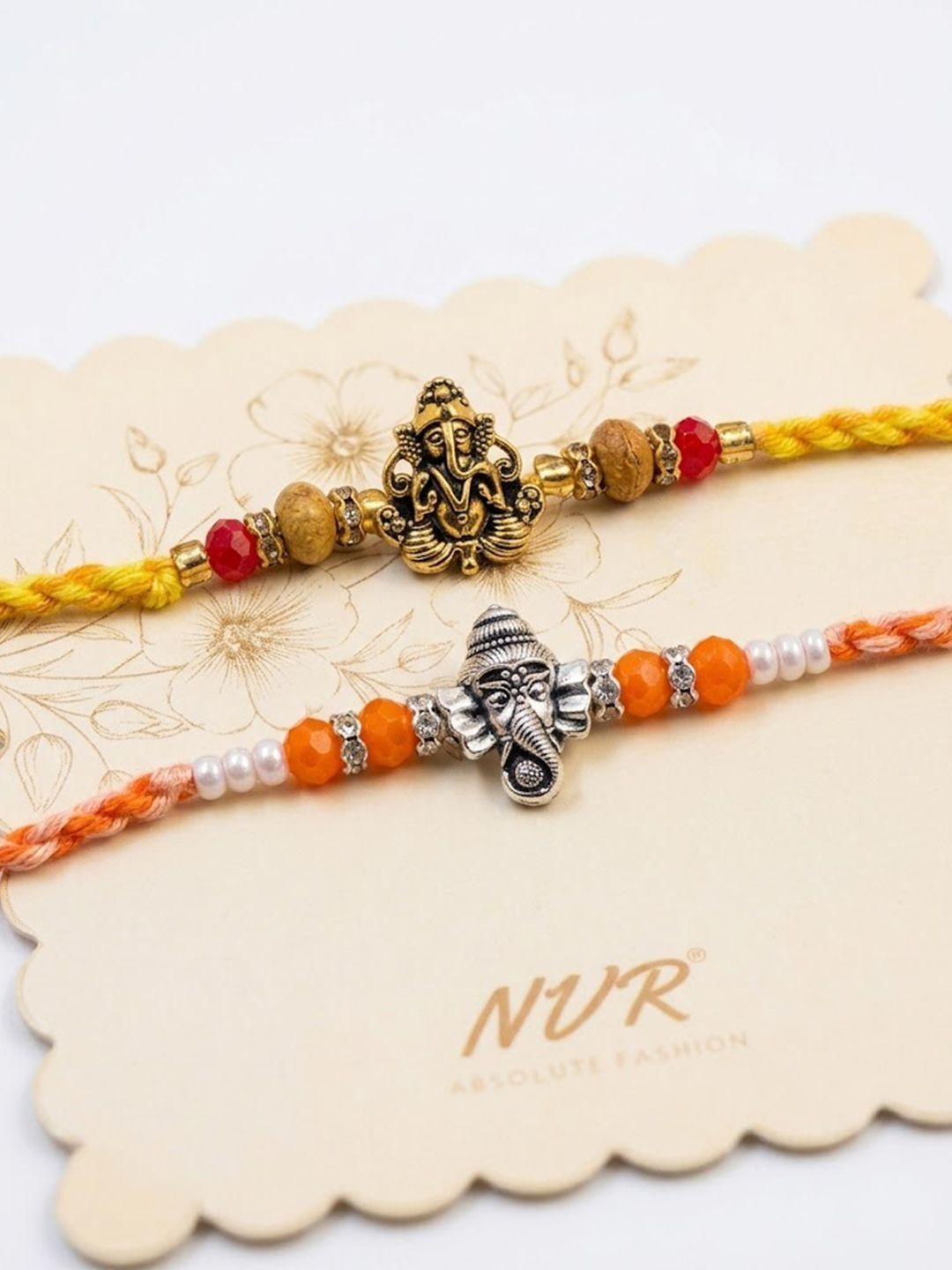 Anouk Set Of 2 Multicolor Religious Thread Rakhi With Roli Chawal Chandan Mishri