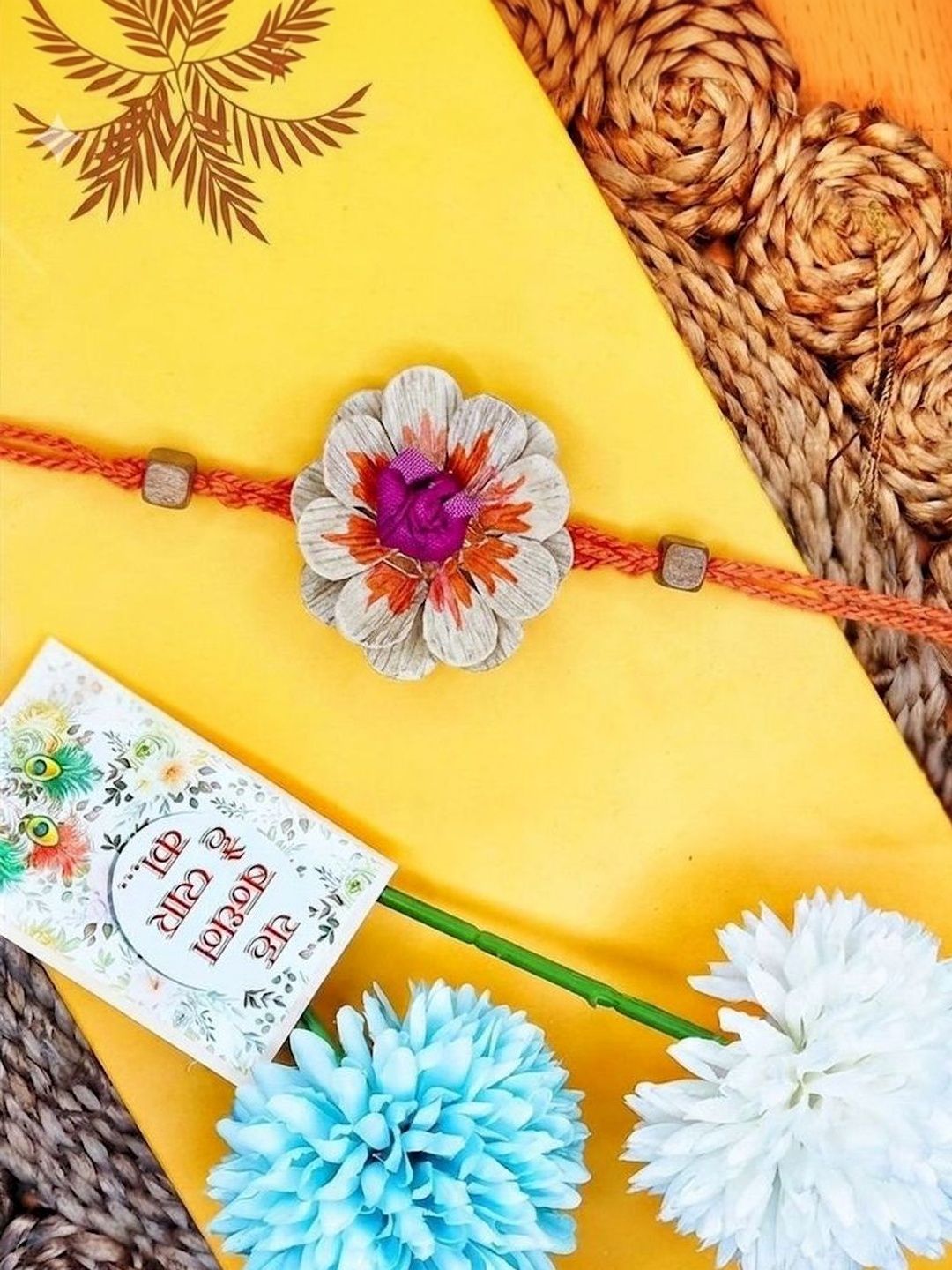 Anouk Multicolor Floral Design Plant Seed Rakhi With Roli Chawal Chandan Mishri