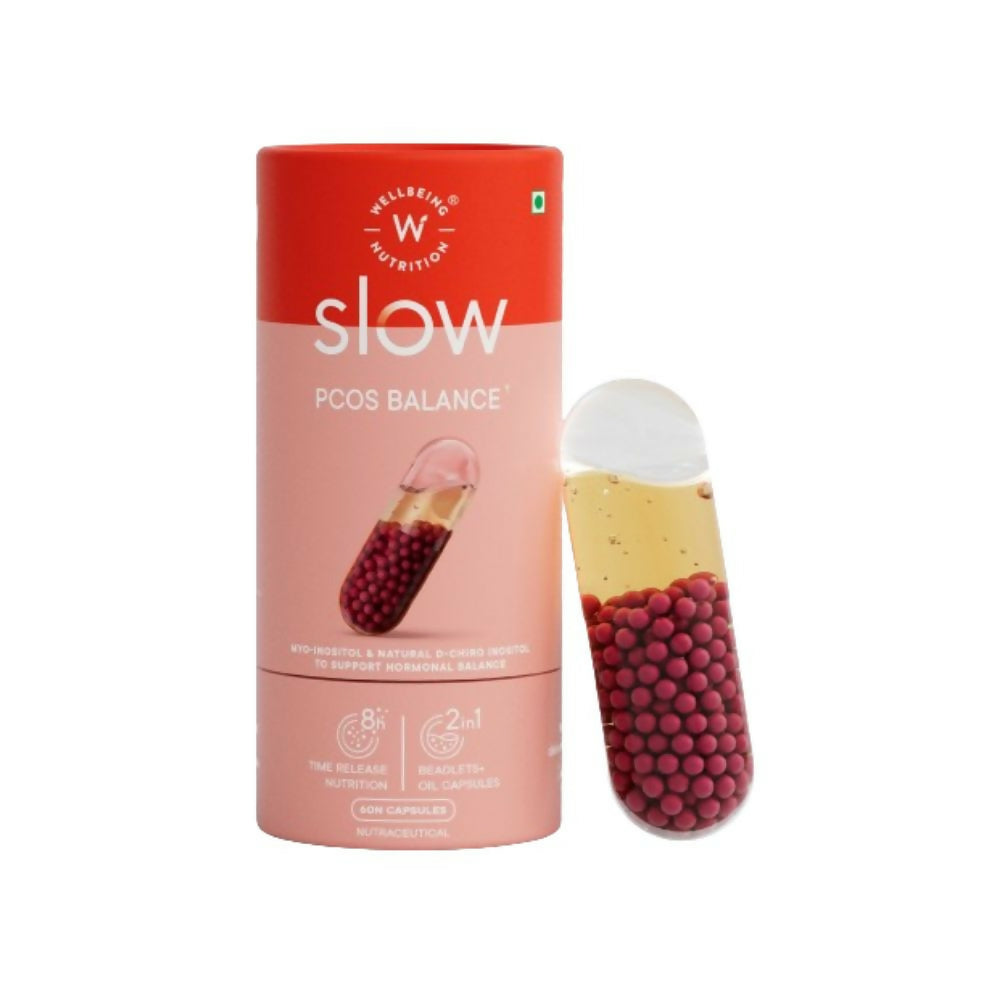 Wellbeing Nutrition Slow PCOS Balance Ayurvedic capsules in a clear bottle with a white label and capsules inside.