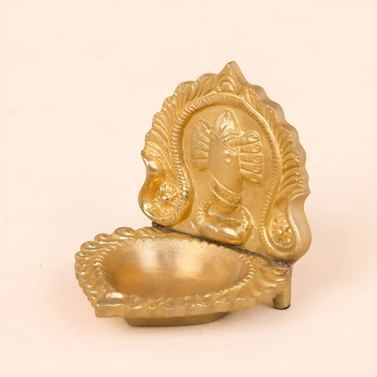 Brass Linga Bhairavi God idol lamp from Isha Life, featuring detailed craftsmanship and traditional design for spiritual worship.
