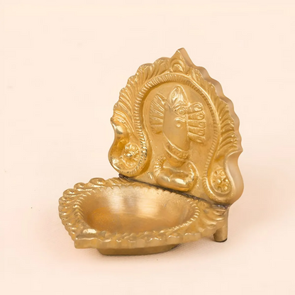 Brass Linga Bhairavi God idol lamp from Isha Life, featuring detailed craftsmanship and traditional design for spiritual worship.