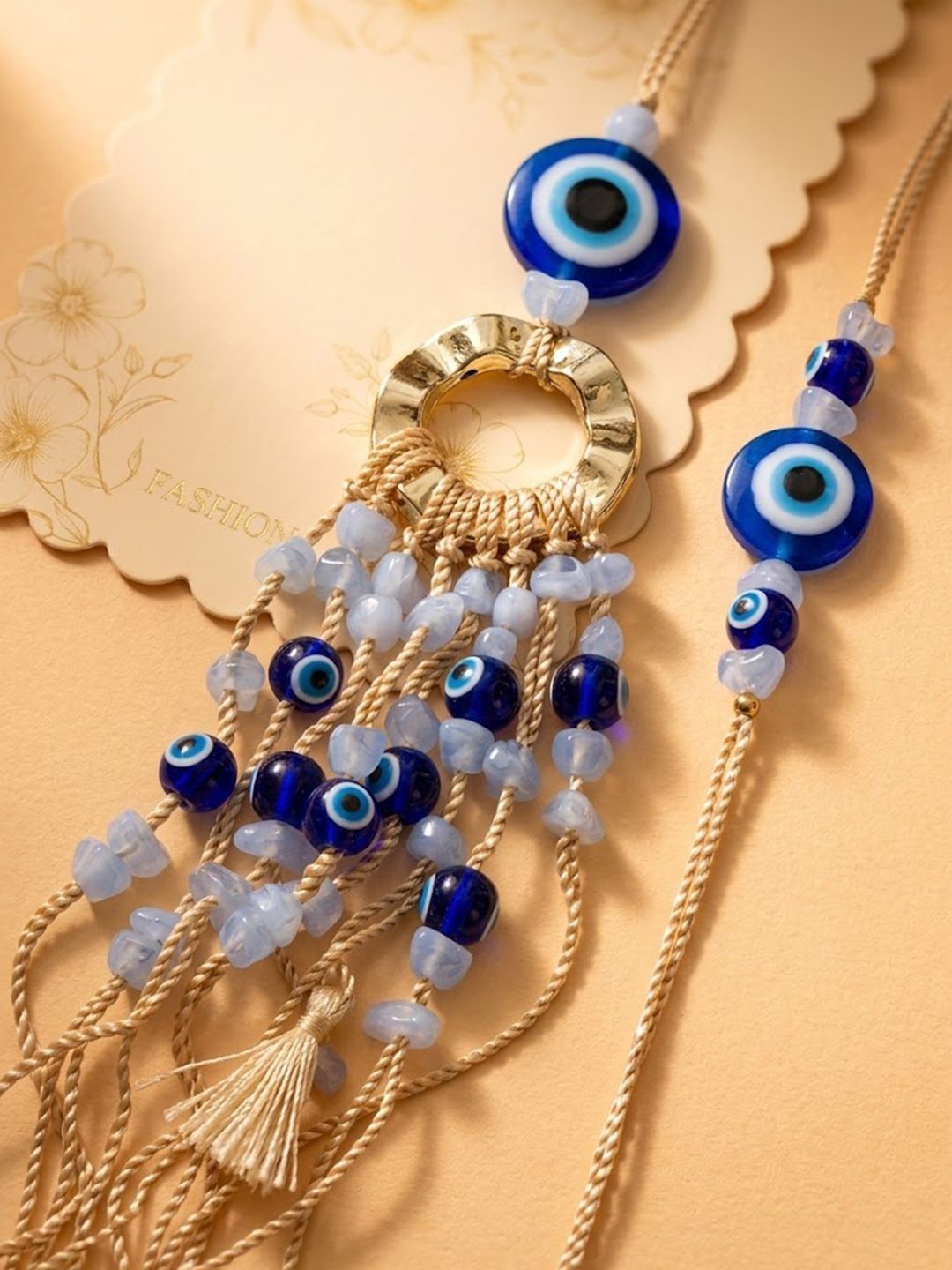 Anouk Set Of 2 Gold Toned Round Evil Eye Bhaiya Bhabhi Rakhi