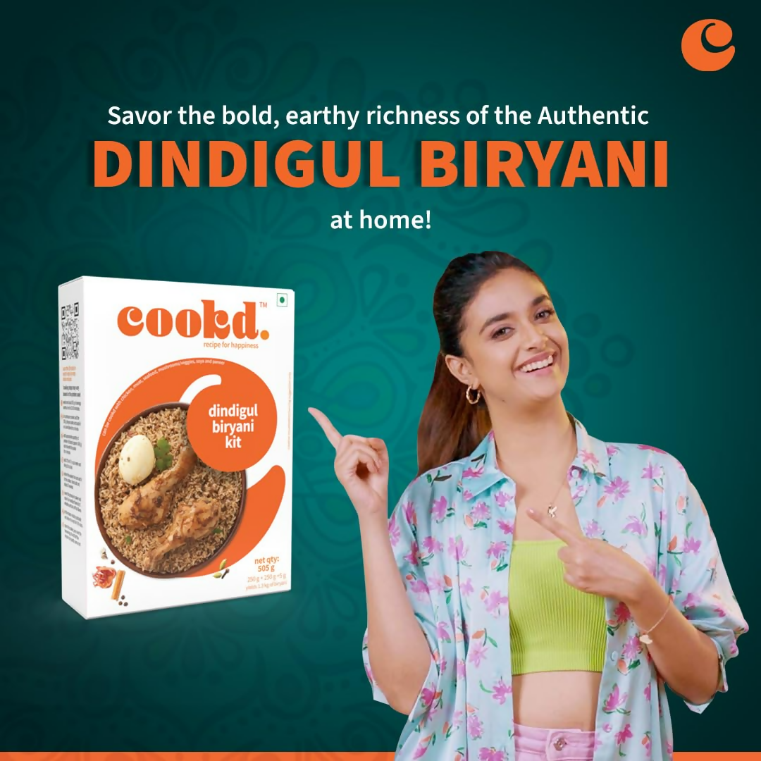 Cookd Dindigul Biryani Kit featuring authentic biryani masala spices in a colorful packaging for flavorful Indian biryani.