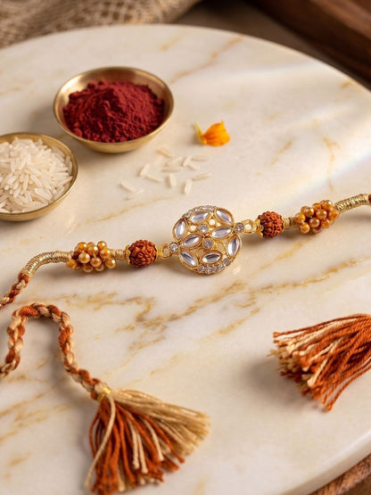 Anouk Rudraksh & Kundan Studded Gold Toned Thread Rakhi With Roli Chawal Chandan Mishri