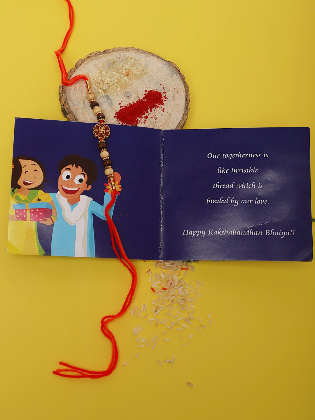 Anouk Unisex Red Swastik Charm & Beaded Rakhi With Roli Chawal & Greetings Card