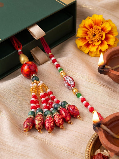 Anouk Set Of 2 Designer Red Artificial Beads Bhaiya Bhabhi Rakhi With Roli Chawal Chandan