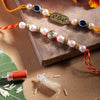 Dhiyona Unisex Set of 2 Beaded Bhai Bhabhi Rakhis With Roli & Chawal