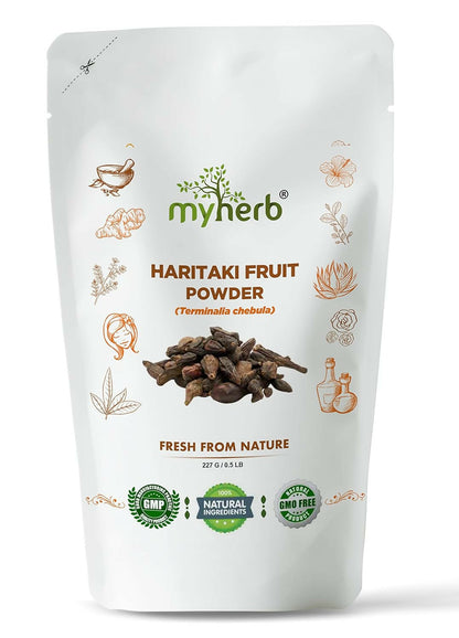 Organic Haritaki powder by Myherb in a clear glass jar, showing the fine, tan-colored Ayurvedic powder on a white background.