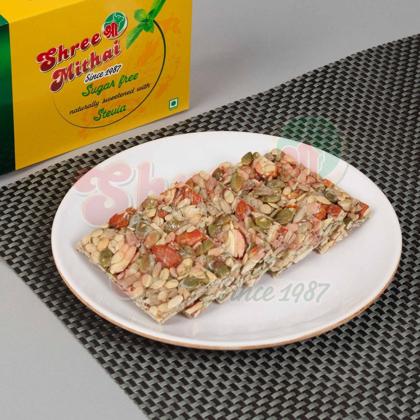 Shree Mithai Sugarfree 4 in 1 Chikki, North Indian sweets, close-up of crunchy, nut-filled sugarfree chikki pieces.