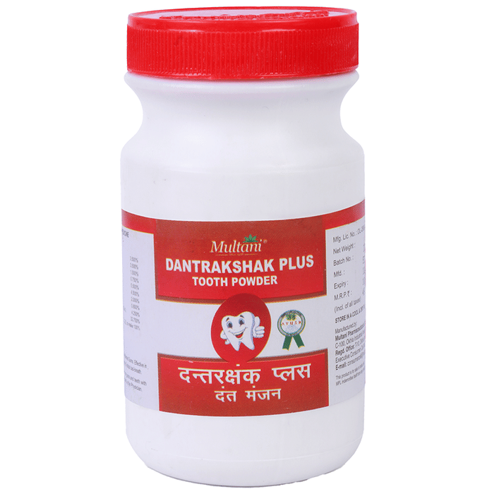 Multani Dantrakshak Plus Ayurvedic tooth powder in a jar, showcasing traditional herbal dental care from the Multani brand.