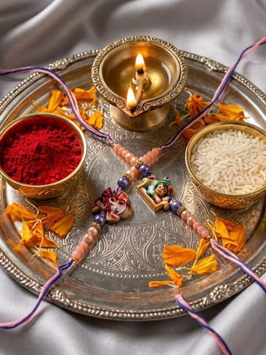 Anouk Set Of 2 Krishna Ji & Ganesh Ji Beaded Religious Thread Rakhi With Roli Chawal