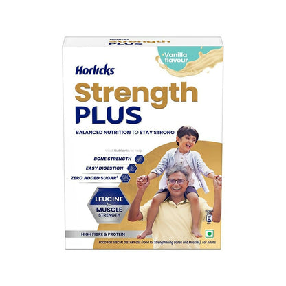 A glass of Horlicks Strength Plus vanilla flavored health drink with a spoon, showcasing the creamy vanilla beverage.