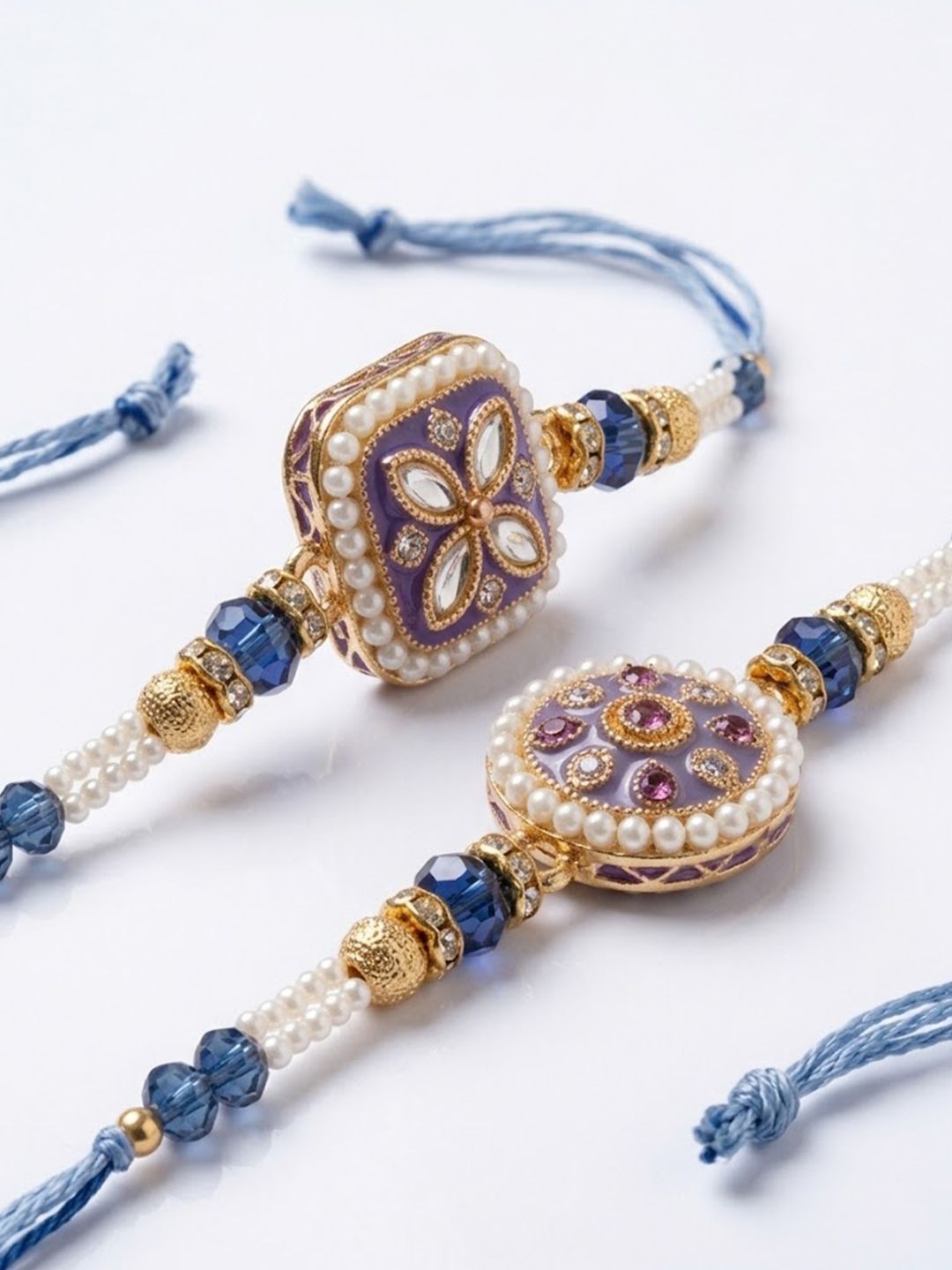 Anouk Set Of 2 White Pearls Thread Rakhi With Roli Chawal Chandan Mishri