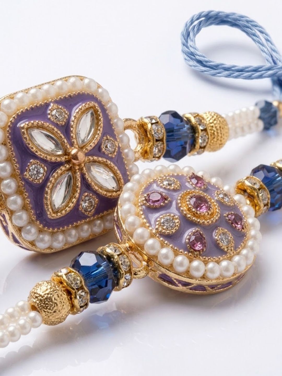 Anouk Set Of 2 White Pearls Thread Rakhi With Roli Chawal Chandan Mishri