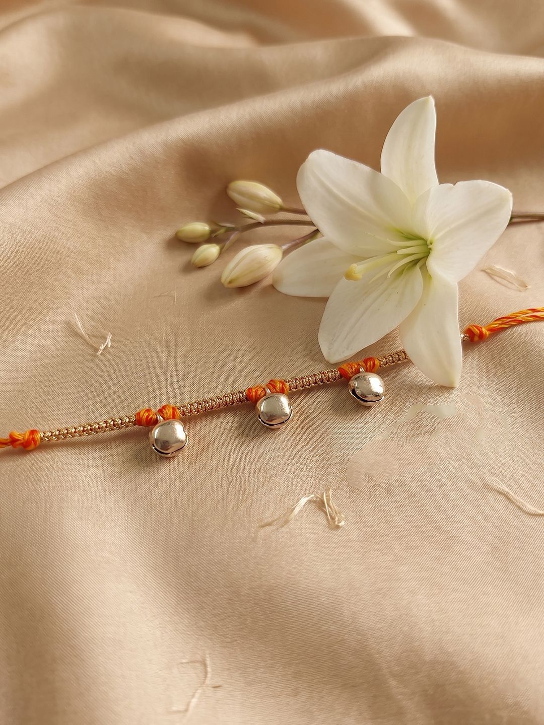 Anouk Golden Ghungroo Thread Rakhi With Roli Chawal Chandan Mishri