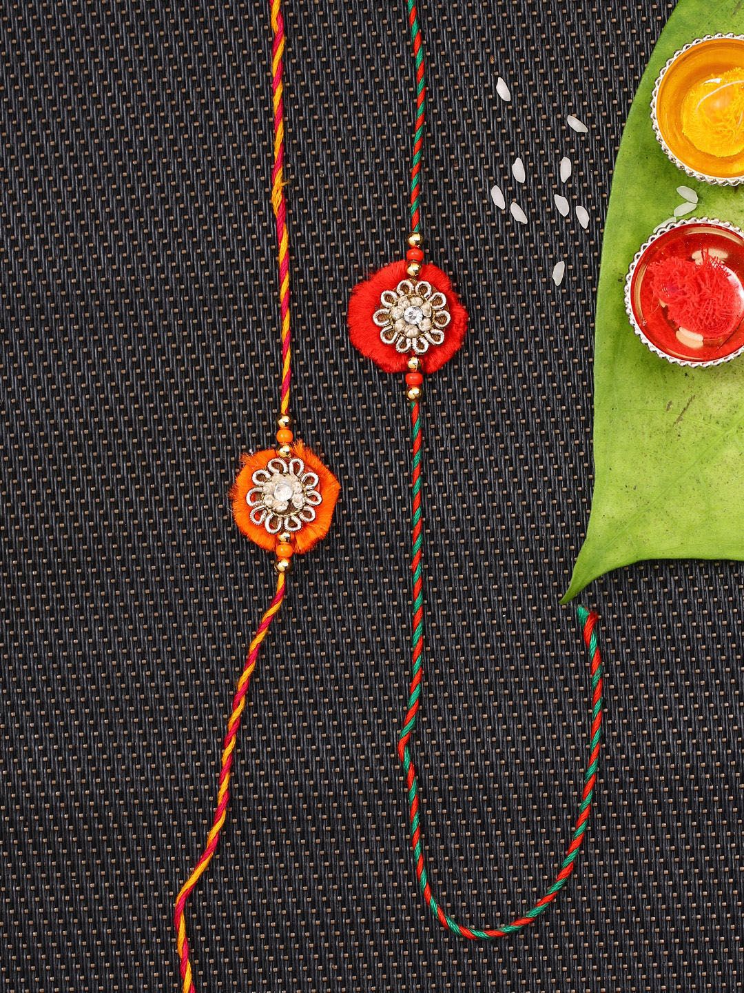 Anouk Set Of 2 Red Flower Design Stone Studded Rakhis Comes With Roli Rice & Greeting Card