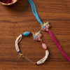Dhiyona Set Of 2 Artificial Beads Radha Krishna Bhaiya Bhabhi Rakhi With Roli Chawal Chandan