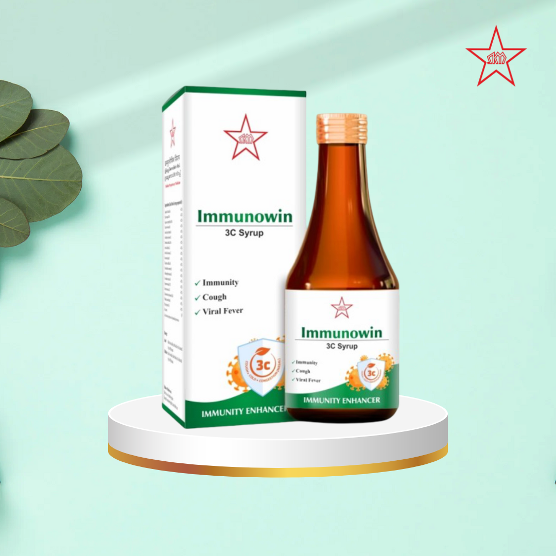 Skm Ayurveda Immunowin 3C Ayurvedic syrup bottle with label, natural ingredients, and health benefits displayed.