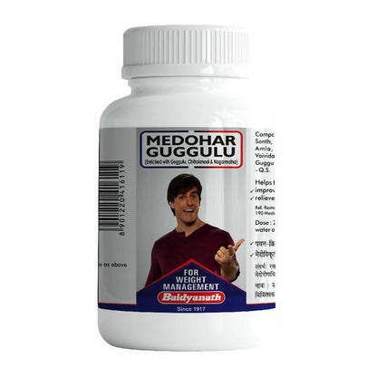Baidyanath Medohar Guggulu Ayurvedic tablets in a bottle, natural herbal supplement for weight management and detox.