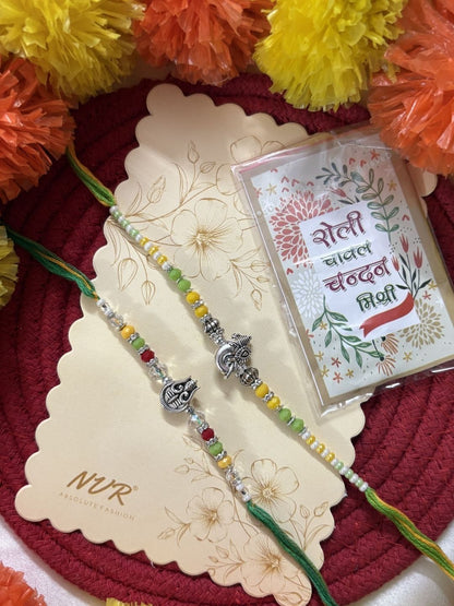 Anouk Set Of 2 Multicolor Religious Thread Rakhi With Roli Chawal Chandan Mishri