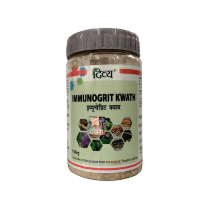 Patanjali Divya Immunogrit Kwath in a glass cup, showing the herbal Ayurvedic herbal drink with dried herbs and powder.