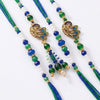 Dhiyona Set Of 4 Green Peacock Design Artificial Beads Thread Rakhi With Roli Chawal