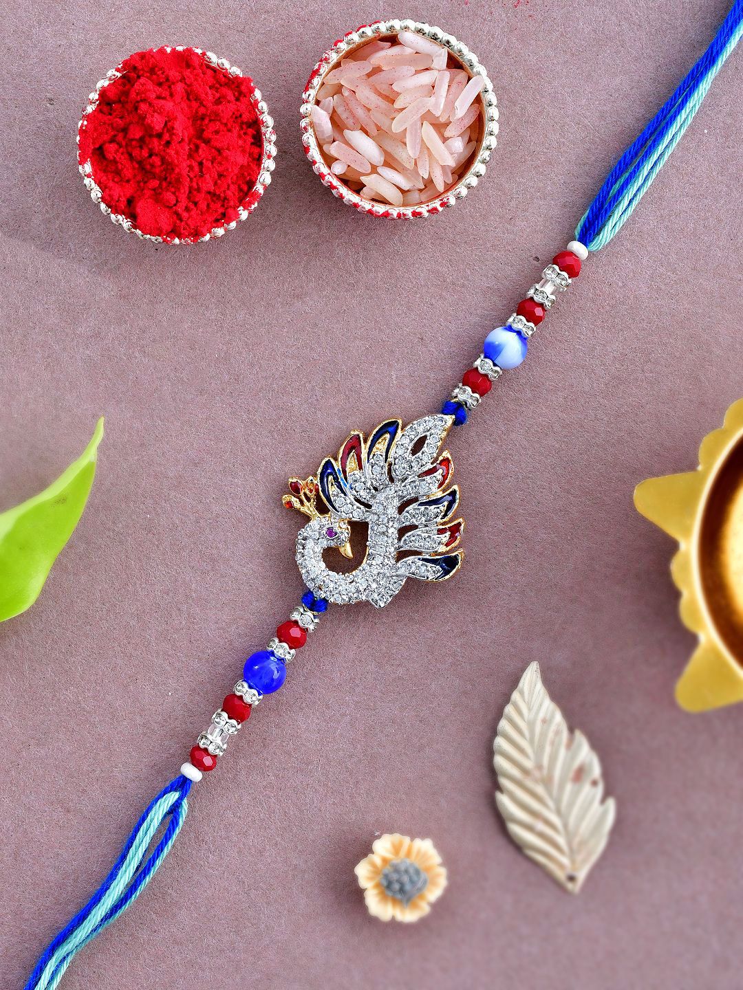 Anouk Blue Swarowski Embellished Peacock Thread Rakhi With Roli Chawal & Greeting Card