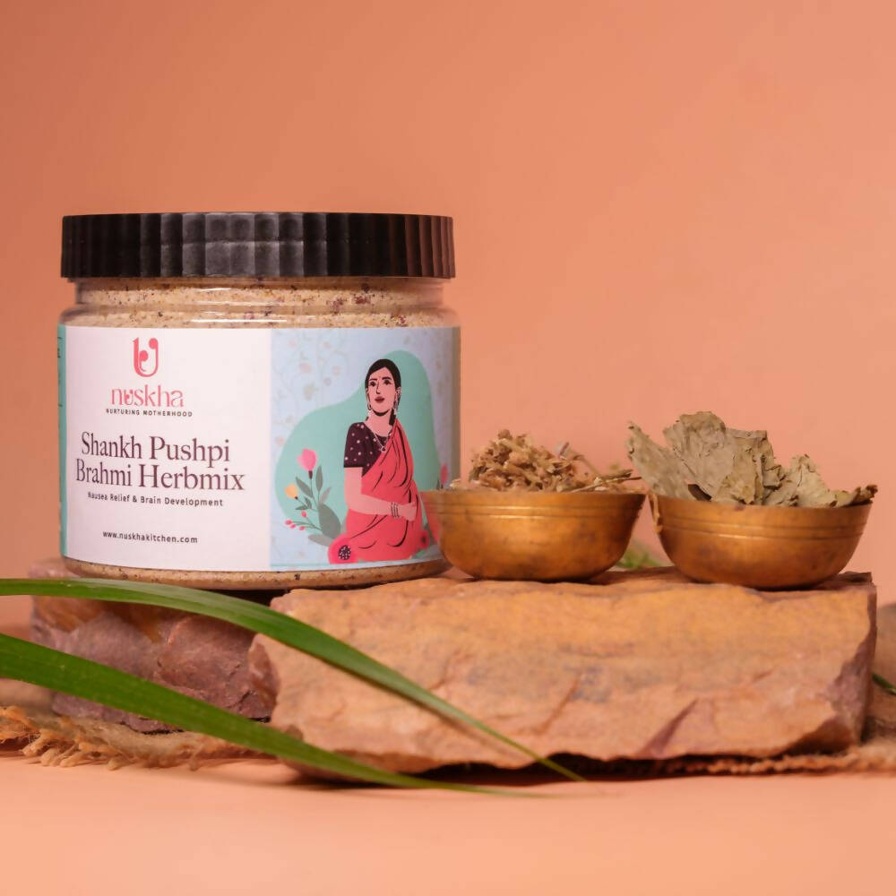 Nuskha ShankhPushpi Brahmi herbal health drink in a glass, showcasing the natural ingredients and packaging.