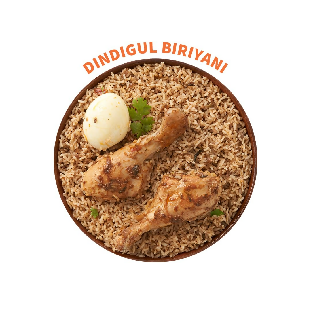 Cookd Dindigul Biryani Kit featuring Biryani Masala packets and spices for authentic Dindigul-style biryani preparation