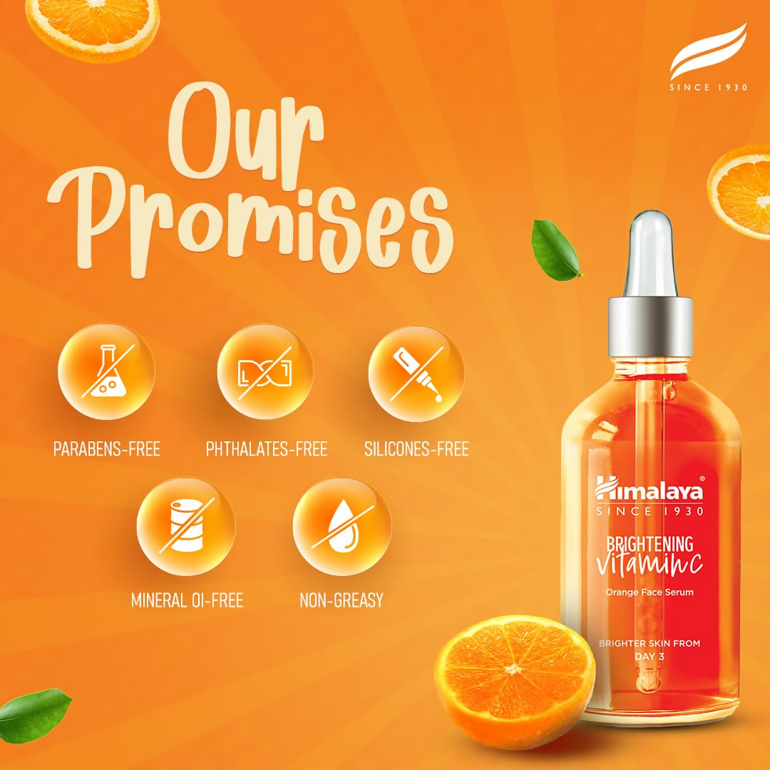 Himalaya Brightening Vitamin C Serum in a clear bottle with dropper, showcasing its vibrant orange color and packaging for skincare.