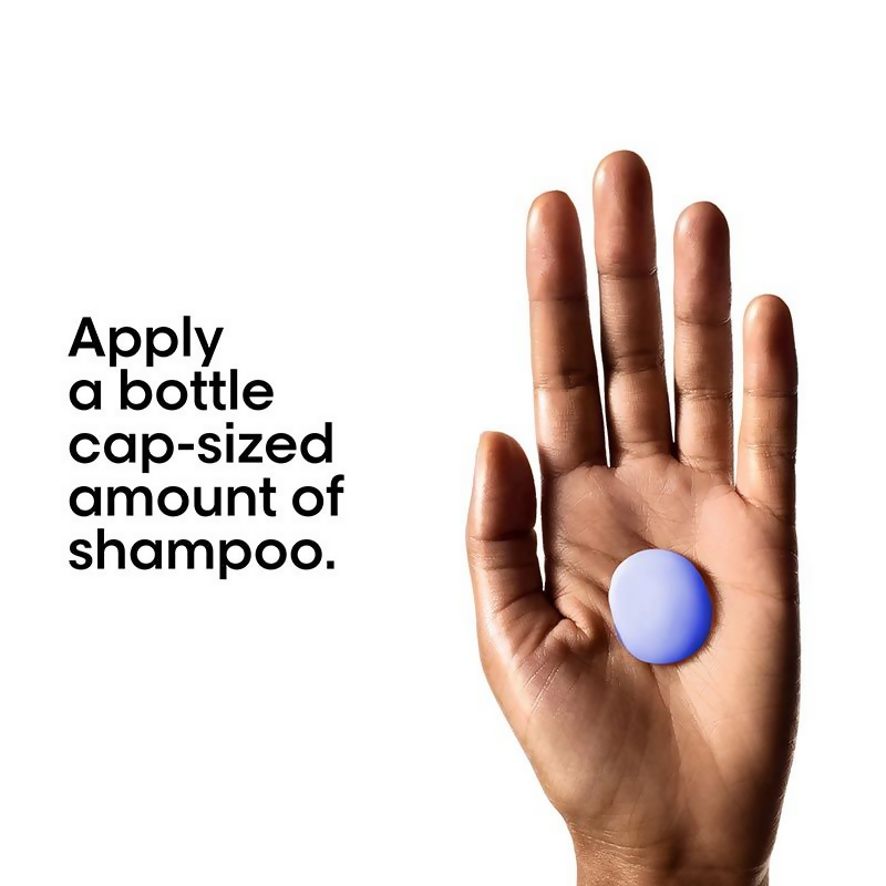 L'Oreal Paris Density Advanced Shampoo for thinning hair, visibly increases volume, in a white bottle with a pump dispenser.