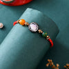 Dhiyona Orange Stone Studded & Beaded Thread Rakhi With Roli Chawal & Greeting Card