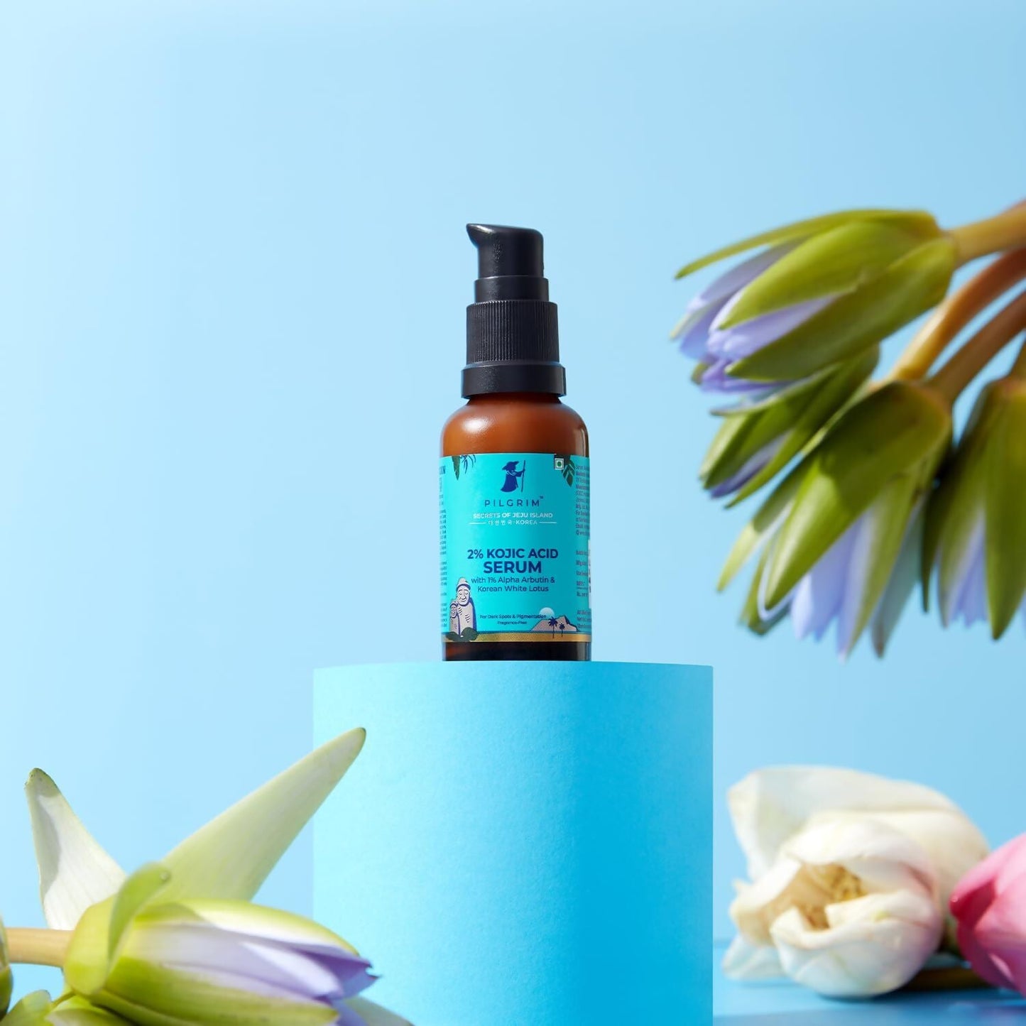Pilgrim 2% Kojic Acid Serum with Arbutin and White Lotus for acne and dark spots, in a clear glass bottle with dropper.