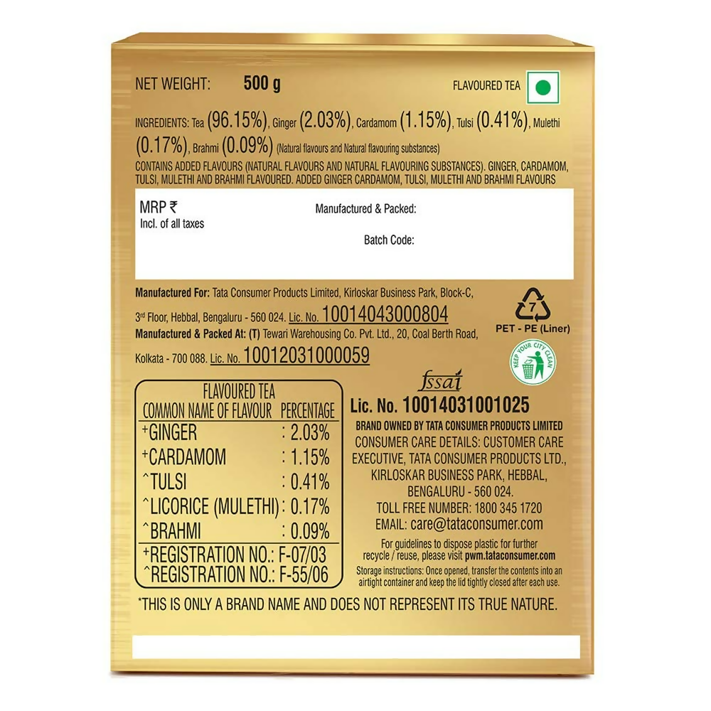 Tata Tea Gold Care Goodness tea powder in a container with a spoon, showcasing the Tata brand and rich tea texture.