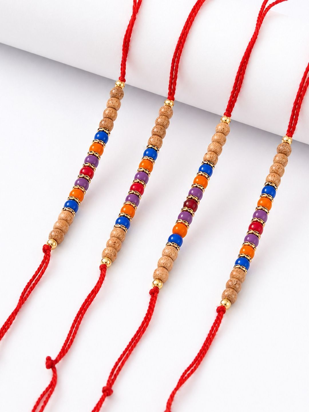 Anouk Set Of 4 Multicolor Circular Beads Studded Thread Rakhi With Roli Chawal Chandan