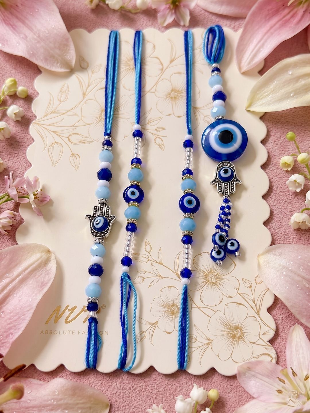 Anouk Set Of 4 Designer Blue Evil Eye Thread Rakhi With Roli Chawal Chandan Mishri