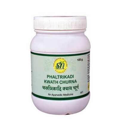 SN Herbals Phaltrikadi Kwath Churna Ayurvedic powder in a glass jar with a wooden spoon, showcasing its herbal blend.