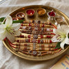 Dhiyona Set Of 10 Multicolor Designer Thread Rakhi With Roli Chawal Chandan Mishri