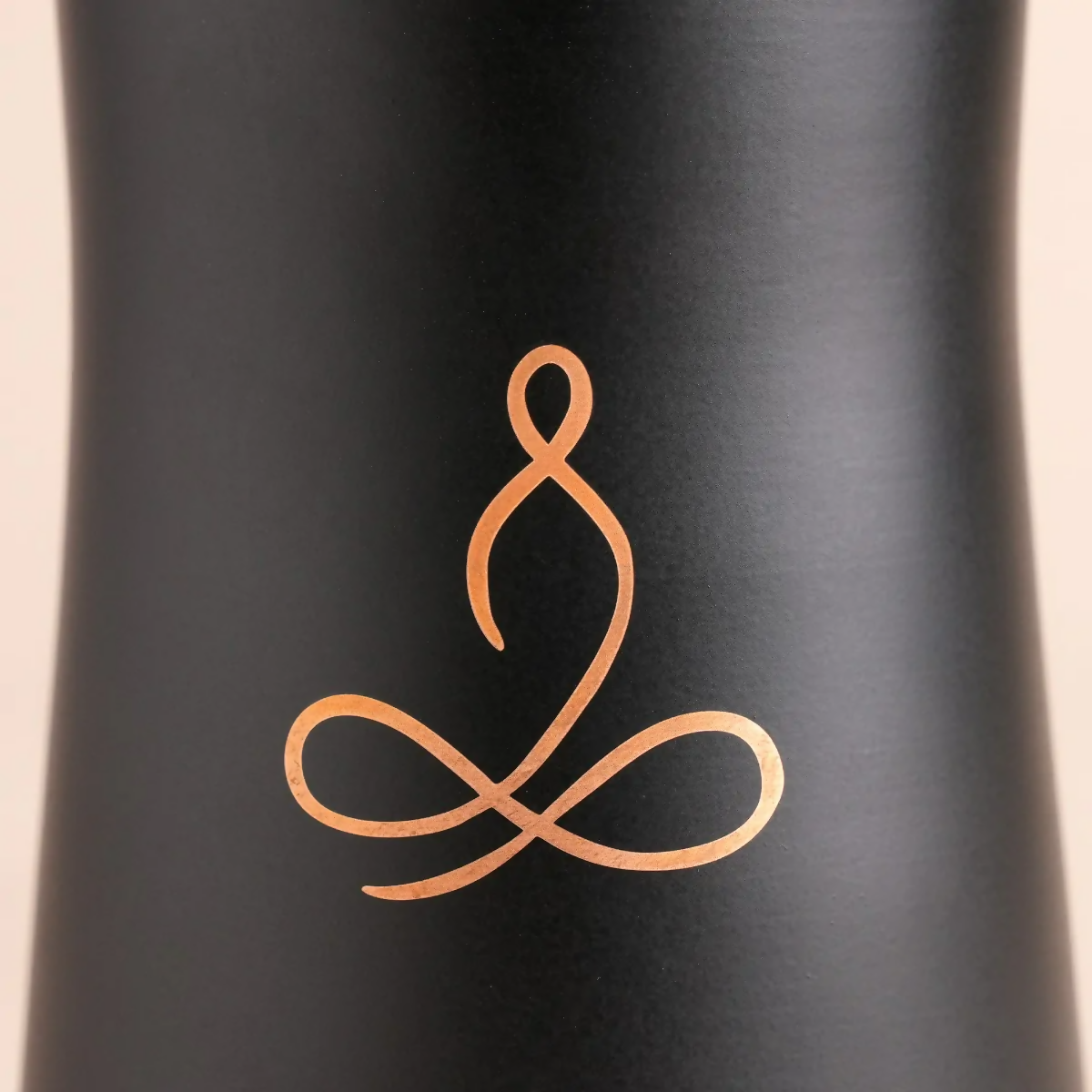 Copper water bottle by Isha Life, 700 ml capacity, with a sleek copper finish and secure screw-top lid, designed for hydration.