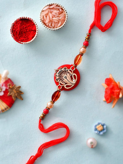Anouk Red Resin-Based Ganesha Rakhi With Roli Chawal & Greeting Card
