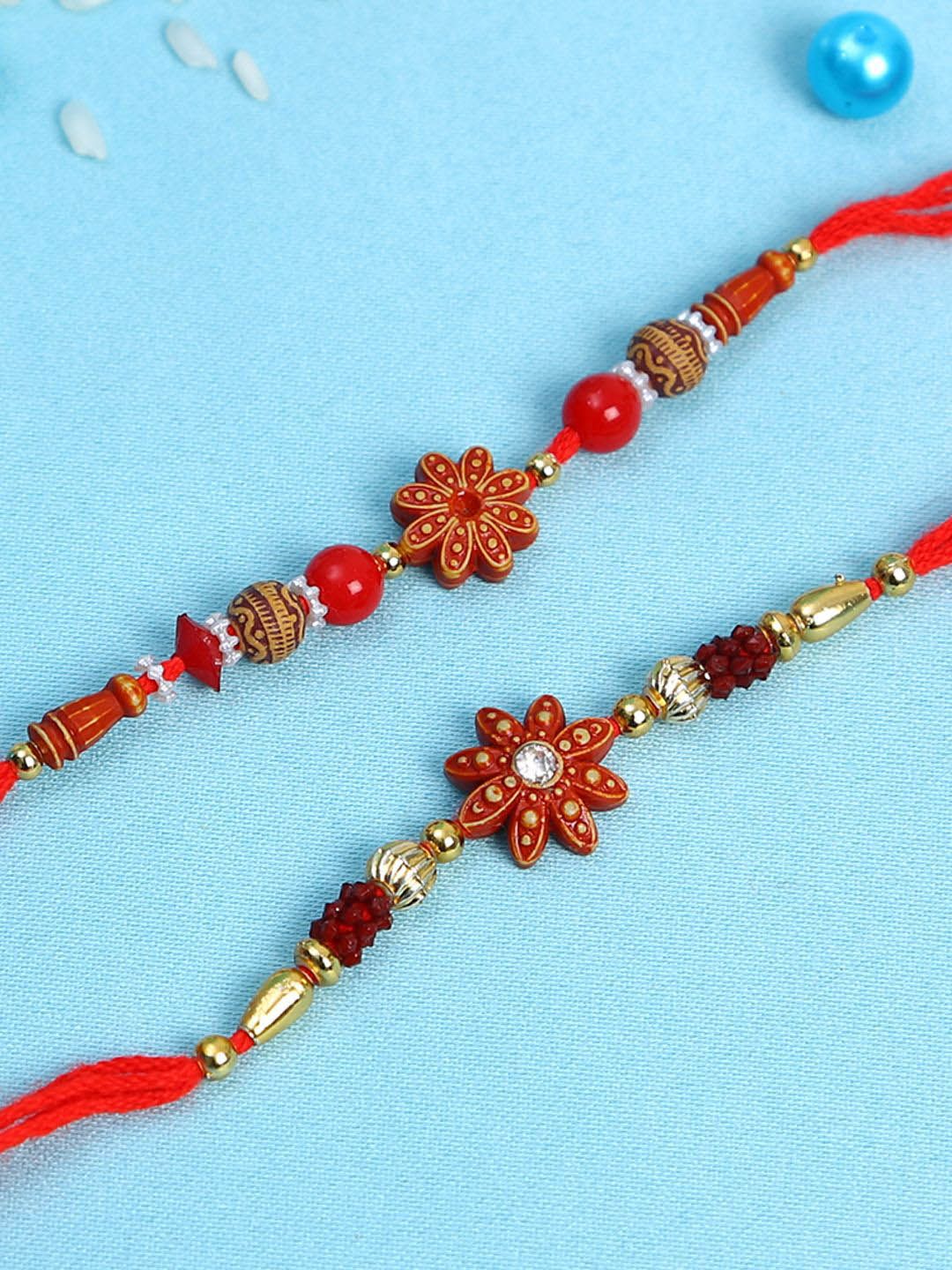 Anouk Set Of 2 Red Flower Rakhis Comes With Roli Rice & Greeting Card