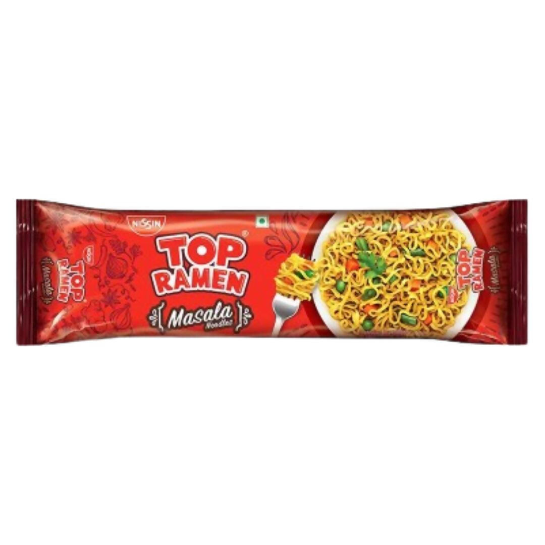 A bowl of Nissin Top Ramen Masala instant noodles with spices and toppings, served in a white bowl on a wooden table.